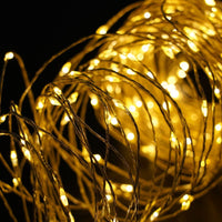 Modee Guirnalda de Luces LED de Navidad 100 LEDs 10m Cable de Cobre Blanco Cálido 2550K IP44 con Adaptador